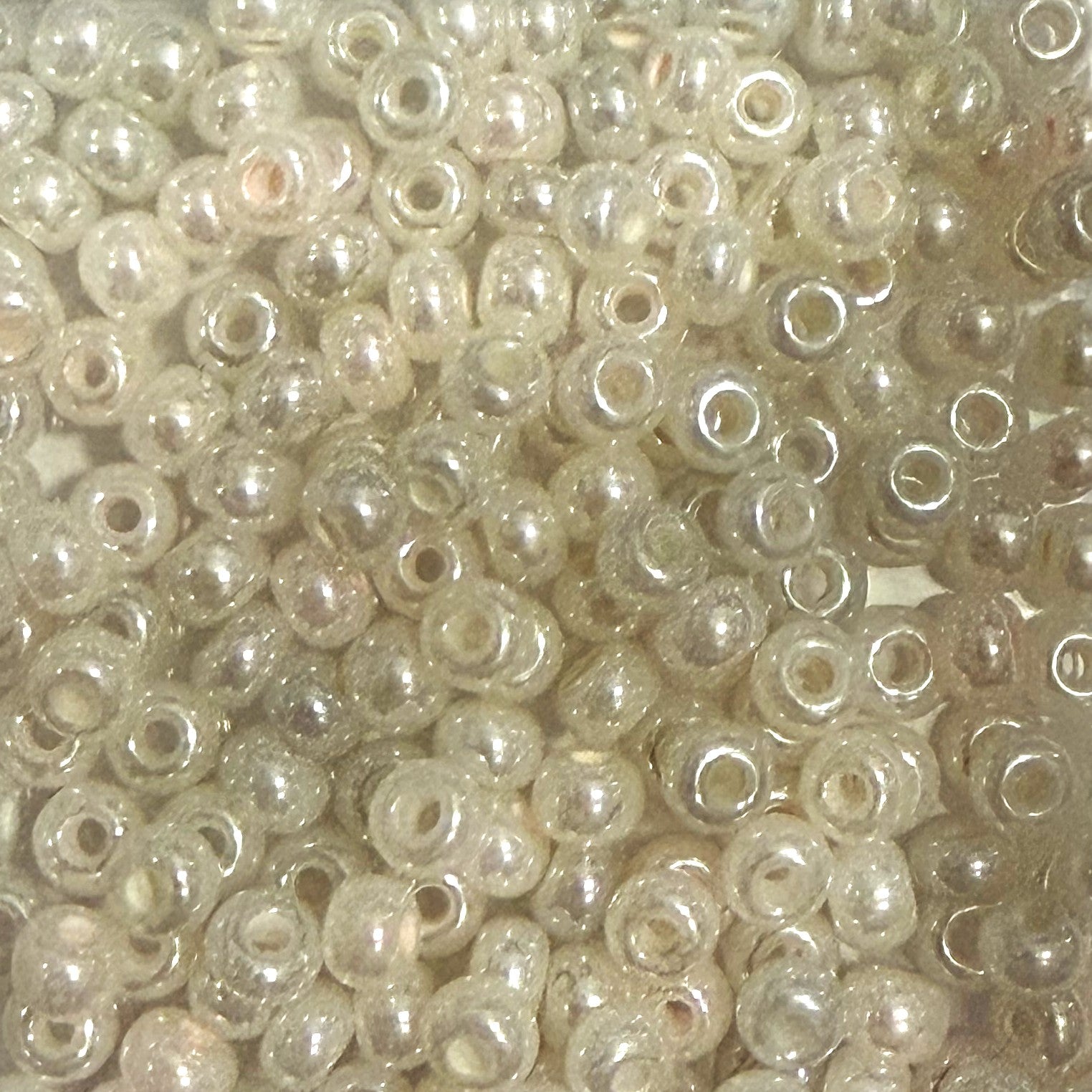 Close-up of small pearl-like beads.